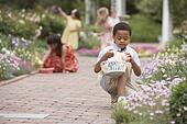 children gathering easter eggs