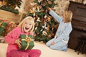 Picture of Child opening Christmas present 1780257 - Search Stock